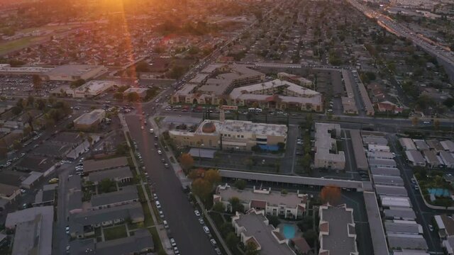 Aerial Zoomed out Sunset of Masjid and city
