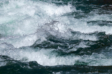 Water mountain river and the wonderful rocky creek. Water Drops after splash. Closeup macro view