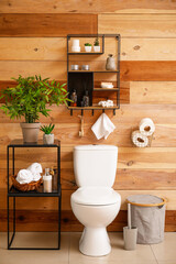 Modern toilet bowl in interior of stylish bathroom