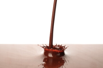 Hot pouring chocolate with splash on white background