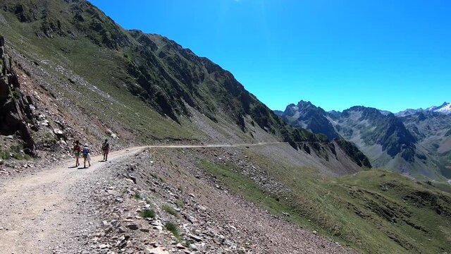 hikers  in the path of the french Pyrenees mountains