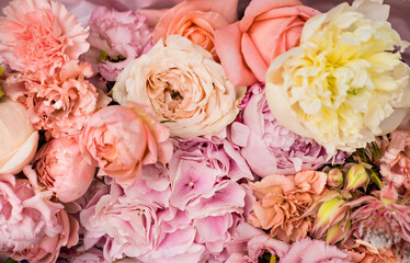 background texture. a bouquet of delicate pink peony roses. bouquets