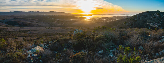 Sunset over the estuary in Morro Bay State Park, California Central Coast, panoramic view