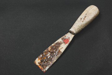 Rusty spatula repair tool, paint instruments.
