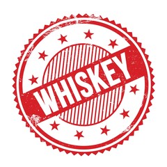 WHISKEY text written on red grungy round stamp.