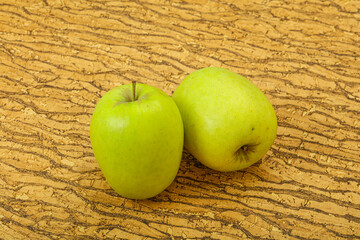 Two ripe green sweet apples
