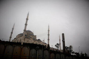 Fototapeta na wymiar A large, neo-Ottoman mosque with six minarets on a hill on the Asian shore of Istanbul.