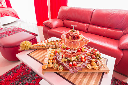 Appetizer dish meze served in a red hotel room