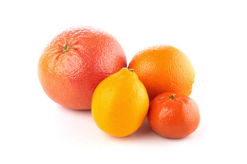Fruit composition. Group of citrus: orange, lemon, mandarine tangerine, grapefruit. full, half and slices on white background, macro close-up
