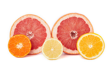Fruit composition. Group of citrus: orange, lemon, mandarine tangerine, grapefruit. full, half and slices on white background, macro close-up