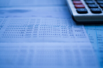 Plan save money 2021 concept. blur image of bankbook and calculator. for background finance.