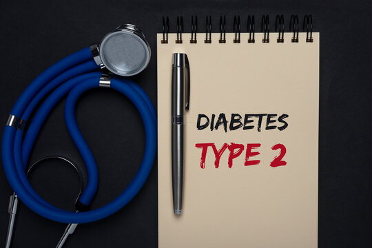 Diabetes Type 2 Inscription On Paper Of Notebook On Black