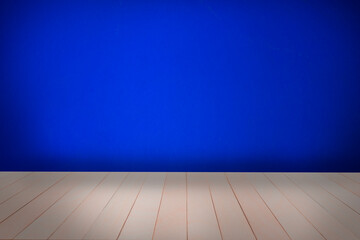 Empty room dark blue cement wall cover with floor old wood table. Gray wood table dark background. grey old rough wooden floor perspective interior.