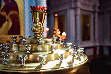 a candle holder without candles in the Church. 