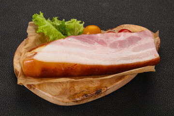 Smoked pork breast with salad leaves