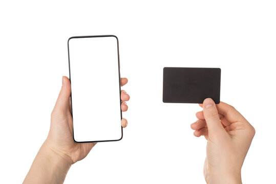 Cyber monday concept. Pov close up view photo of female hands holding smart telephone with blank empty display and black card with bonus certificate isolated white background