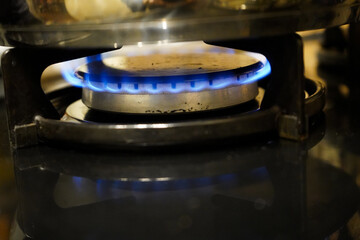 Pan on top of a gas burning hob