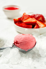 Strawberry ice-cream and strawberry in studio