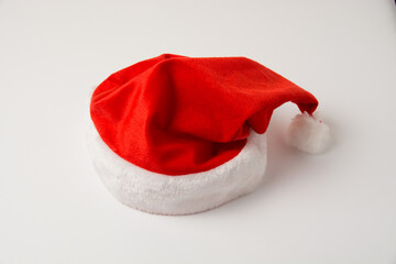 Volumetric santa hat on white background, isolate close-up with copy space
