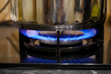 Pan on top of a gas burning hob