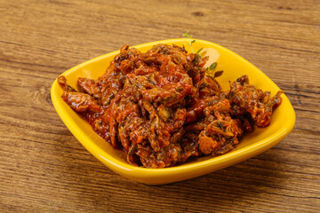 Canned anchovy in tomato sauce