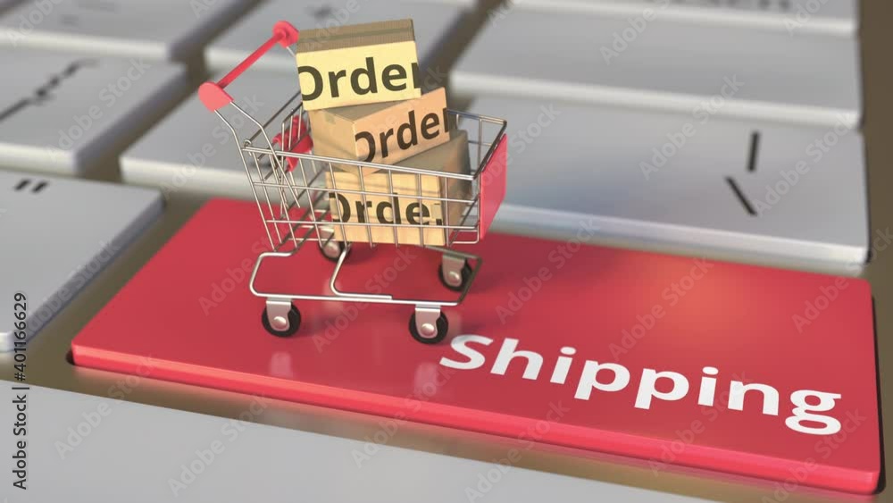 Poster shipping text on computer keyboard and boxes in small shopping cart. electronic business conceptual 