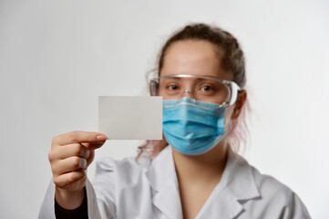 Doctor showing her business card