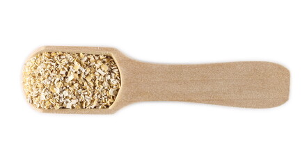 Oat bran pile in wooden spoon isolated on white background, top view