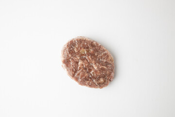 frozen beef burger on white background