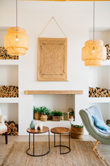 Scandinavian-style interior with fireplace, niches in wall where wood is stored.