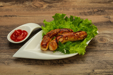 Roasted chicken white sausages with ketchup