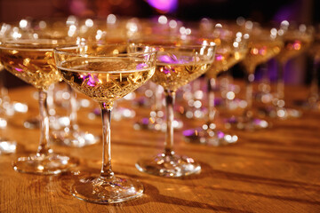 Glasses with Sparkling Wine. Celebration, party concept with champagne glasses. Selective focus.