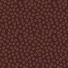 Seamless background with random elements. Abstract brown and golden ornament. Dotted abstract pattern