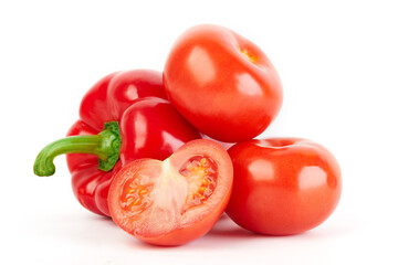 Fresh vegetables: tomatoes and red pepper isolated on white background macro close up. 