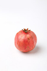 Fresh pomegranate fruit on white background