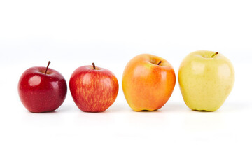Fresh fruits: different colorful apples isolated on white background macro close up. 