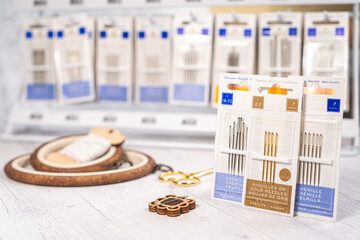 Accessories for hobby. Hoop snaps, threads, needles and scissors. Vintage tools for embroidery and knitting