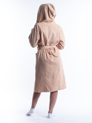 woman in a dressing gown from the back on an isolated white background.