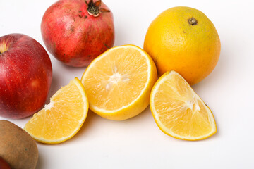 Apple,pomegranate and sweet lemon mosambi slice on white background