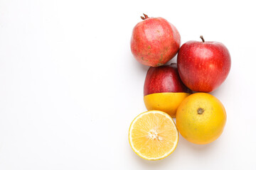 Apple,pomegranate and sweet lemon mosambi slice on white background