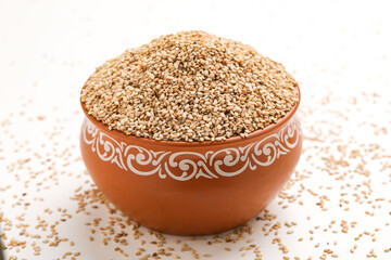 Sesame seed in bowl on white background