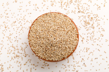 Sesame seed in bowl on white background