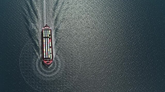 Cargo ship in the sea with radar and antenna signal-aerial 
with technology WIFI connection communication Radar and wireless 5G internet network for logistic transportation .
