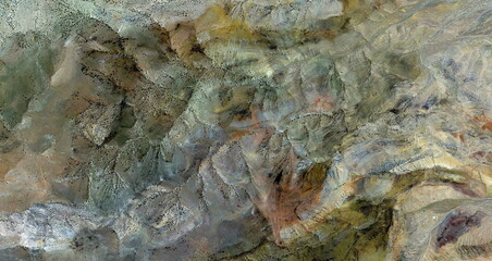 the colors of the earth, United States, abstract photography of relief drawings in  fields in the...