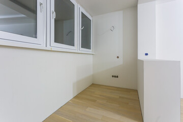 Empty unfurnished room with minimal preparatory repairs. interior with white walls