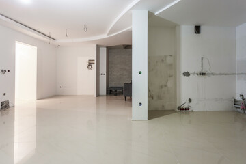 Empty unfurnished room with minimal preparatory repairs. interior with white walls