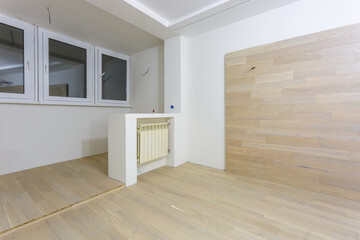 Empty unfurnished room with minimal preparatory repairs. interior with white walls