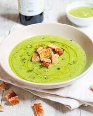 Zucchini and potato soup with bread croutons. Vegan food