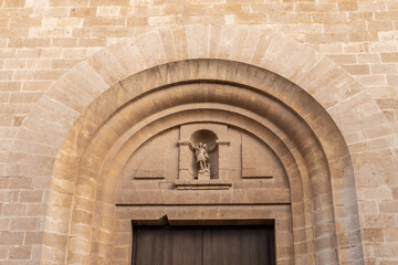Fototapeta na wymiar Main facade of the church in the Majorcan town of Llucmajor