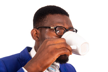 close-up of a young businessman drinking coffee